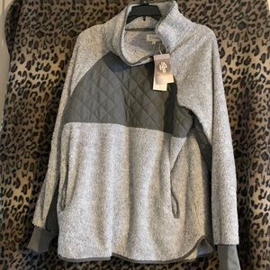 Light grey and dark grey long sleeve pullover with pockets and snap closure